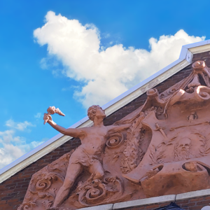 South Side Turnverein final relief sculpture recreation on building. Photo Credit: Mary Beth Mullens