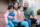 family-sitting-on-front-steps